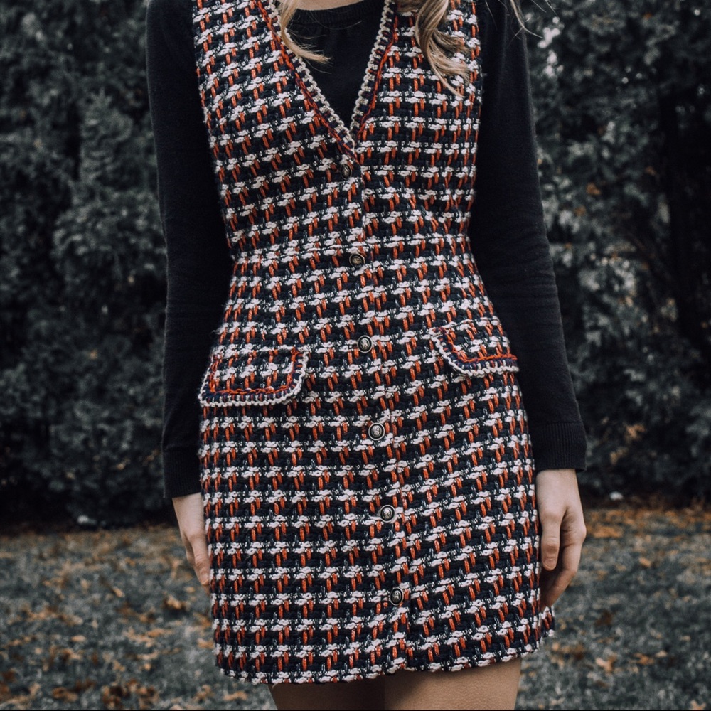 Jumper with one missing button